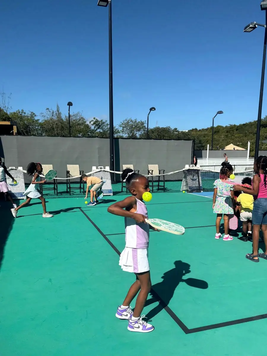 Junior Academy class on the club court in Providenciales