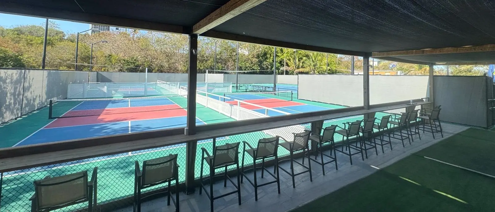 View of the courts from the covered terrace