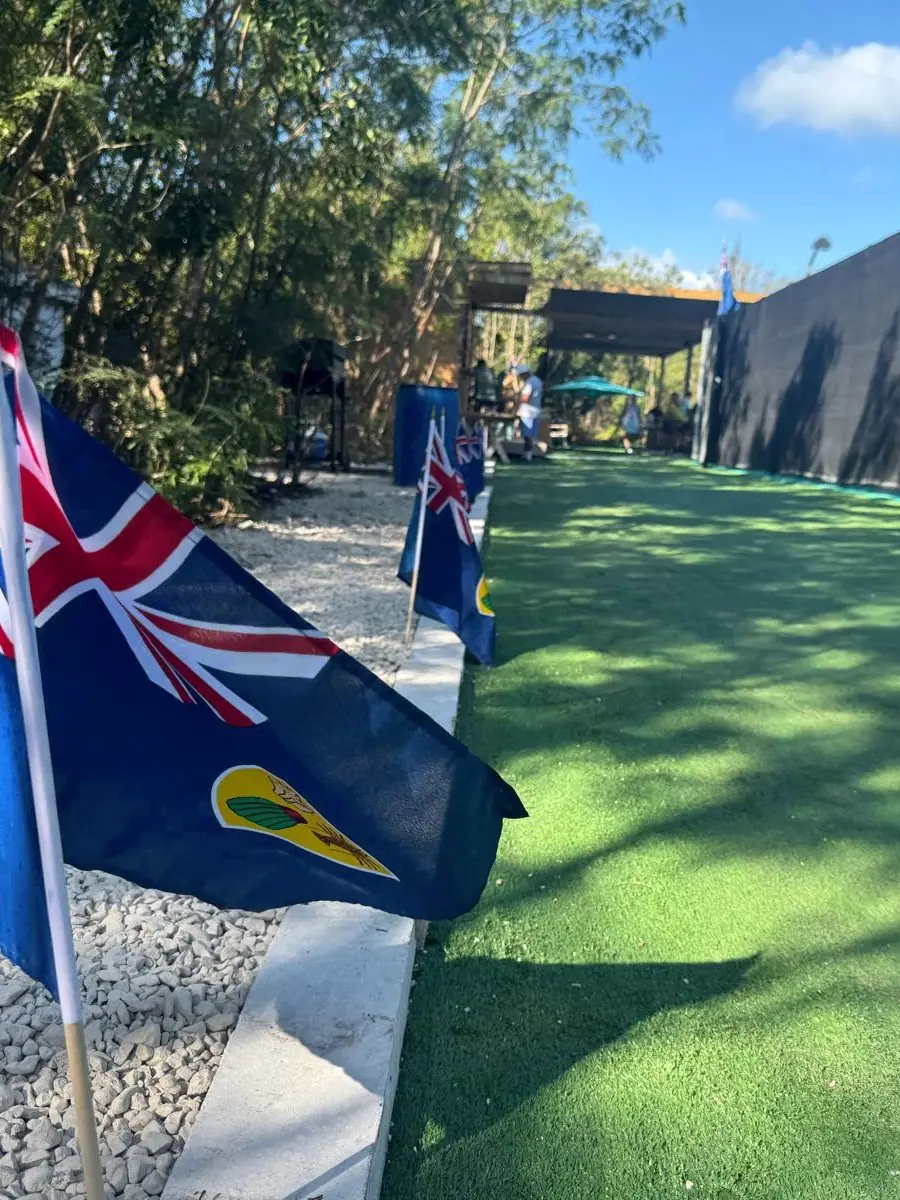 Turks and Caicos flags at the entrance to the club