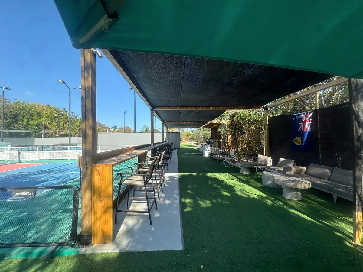Bar of the club facing the courts